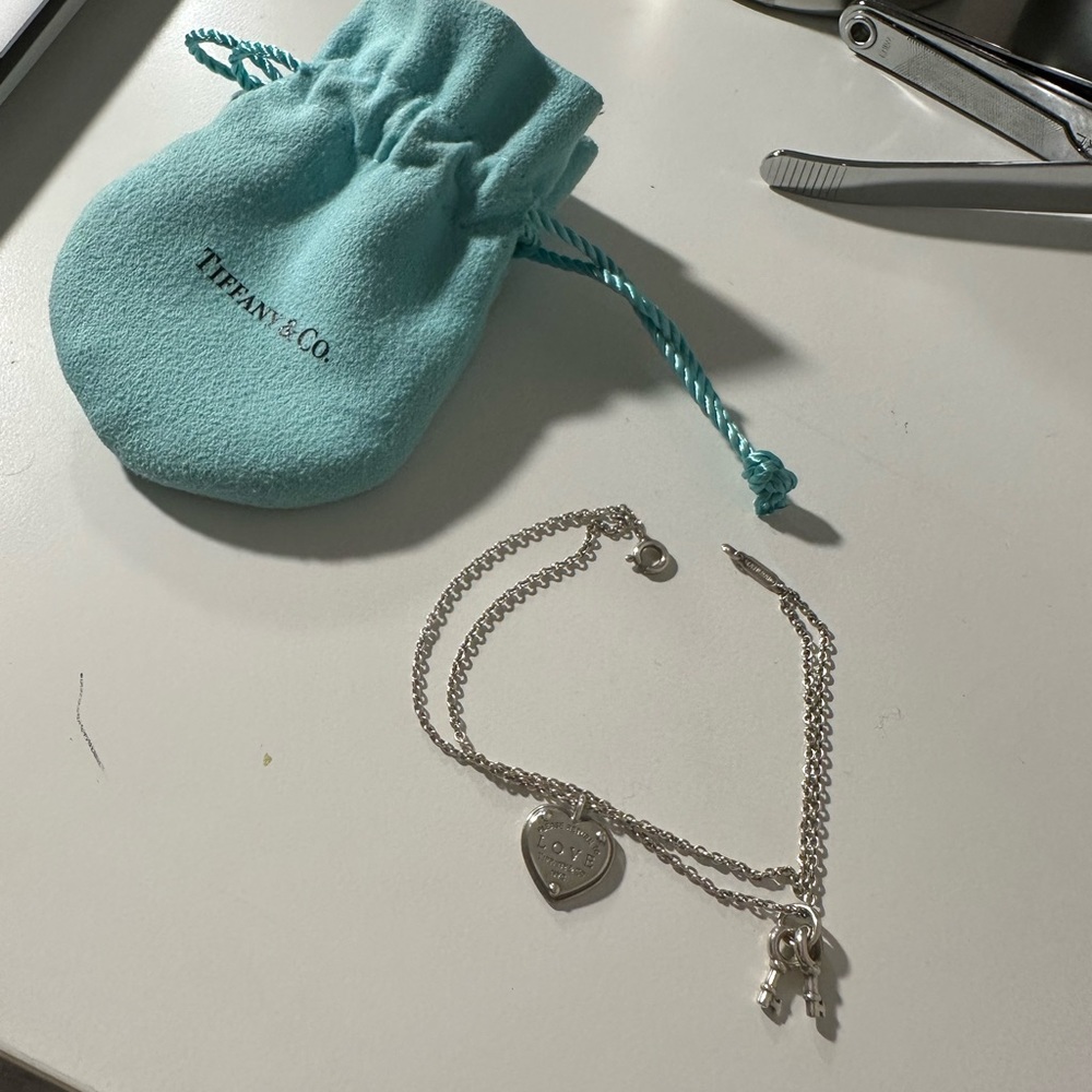 TIFFANY & CO. Return to tiffany heart tag with keys bracelet. WORN TWICE MAX.